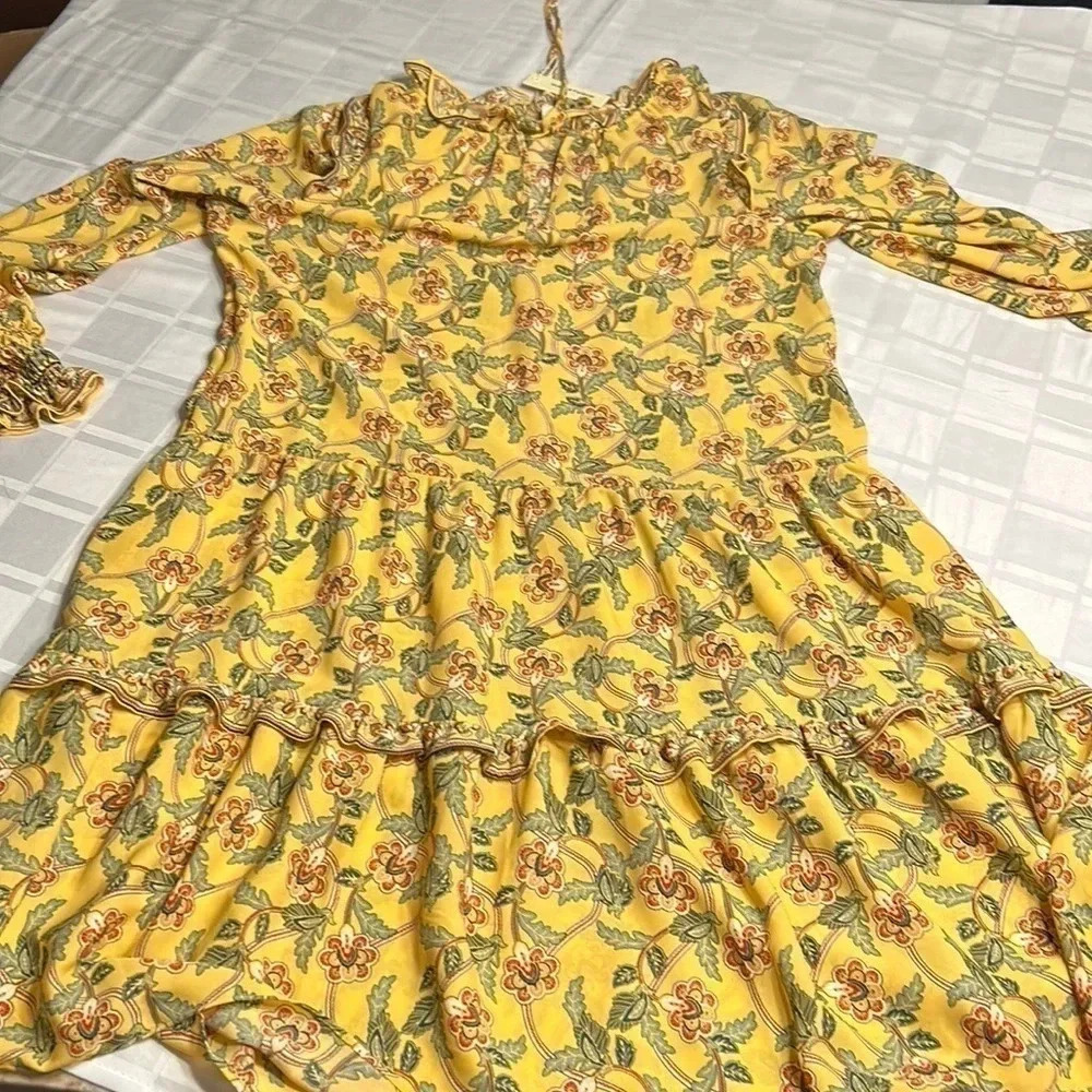 Ruffle,tiered,floral,frill dress,shirring cuffs,tie front,wood accent,keyhole